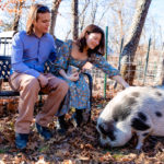 married couple with pet pig